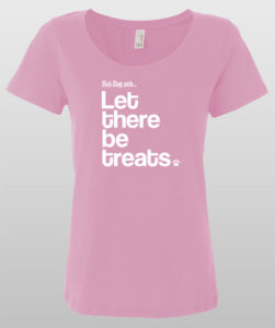 Pink T-shirt with "Let there be treats" text in white.