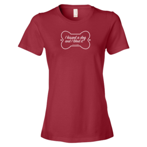 Red t-shirt with "I kissed a dog and I liked it" in a bone design.