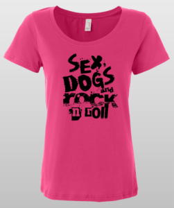 Pink t-shirt featuring bold black text “Sex, Dogs and Rock 'n Roll.”