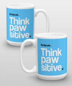 Two blue mugs with "Think Pawsitive" paw print graphic.