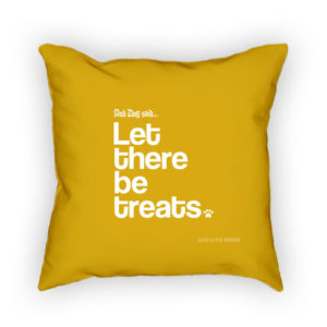Yellow pillow with playful dog-themed text: "Let there be treats.