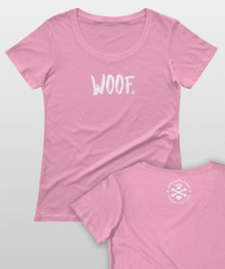 Pink t-shirt with "WOOF" on the front and paw-themed logo on the back collar.