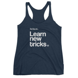 Navy tank top with "Learn new tricks" text in bold white font.